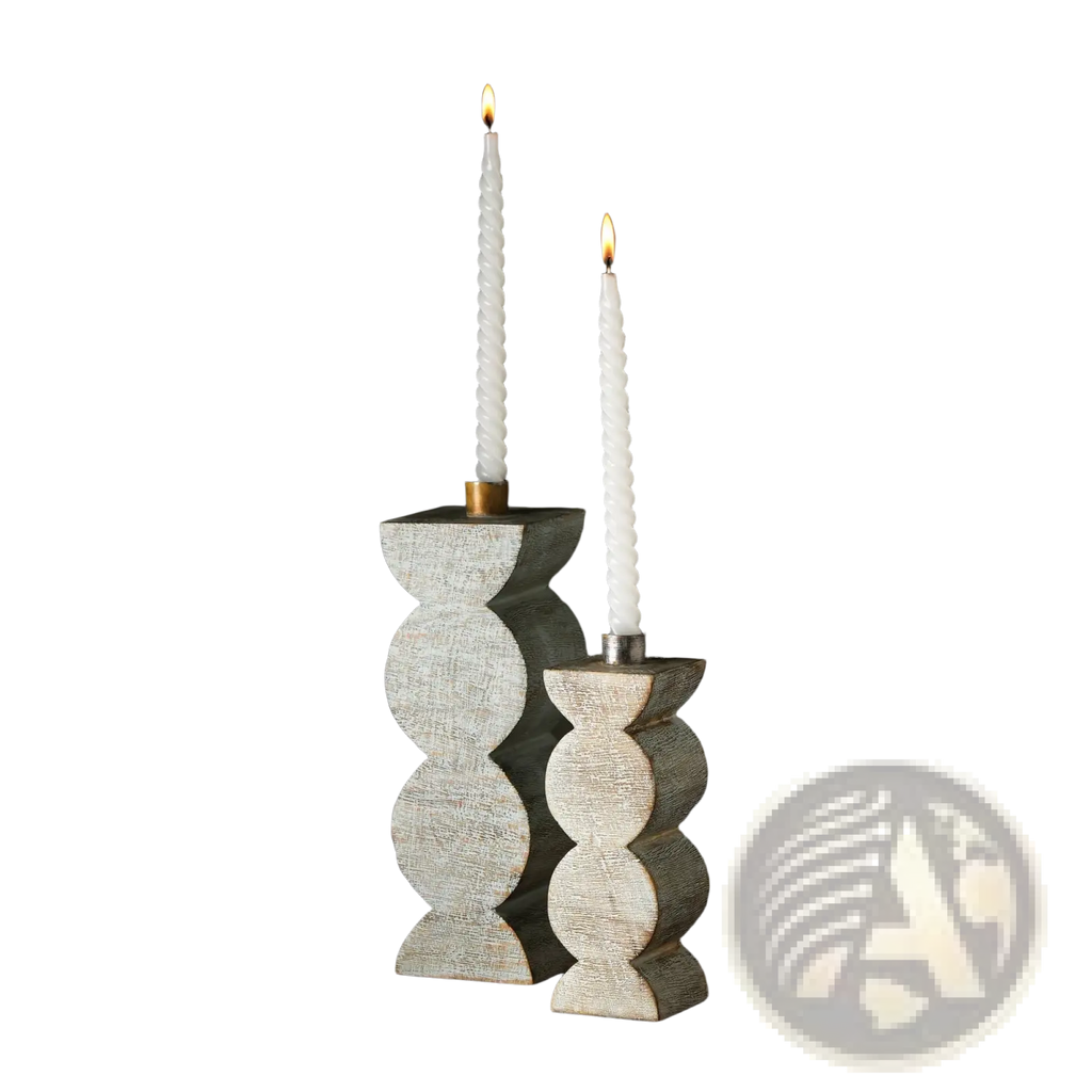 Two elegant gray wooden candle holders with textured segmented design holding lit white twisted taper candles
