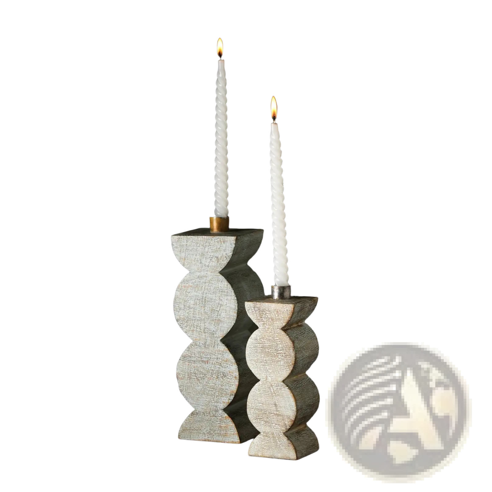 Two elegant gray wooden candle holders with textured segmented design holding lit white twisted taper candles