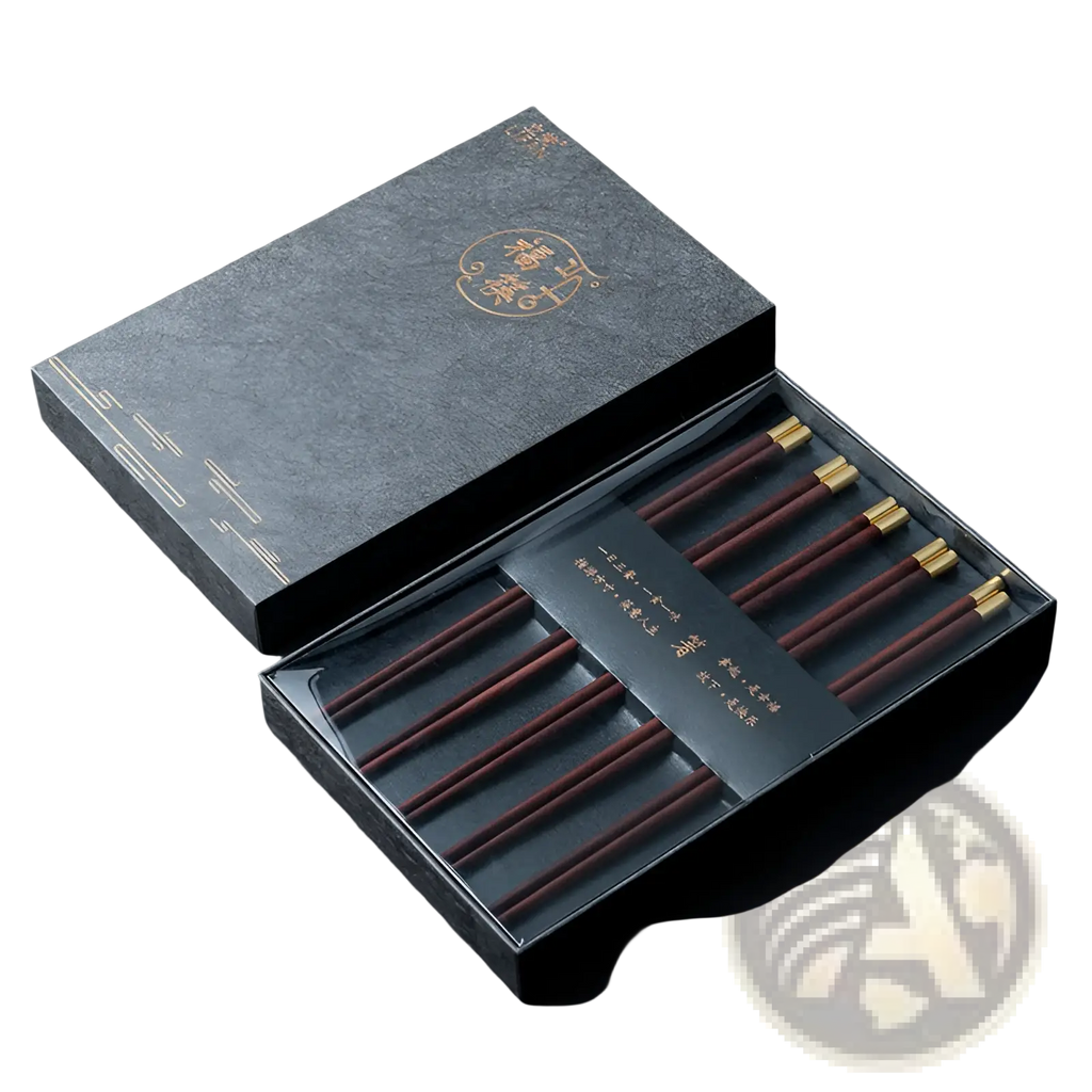 Set of six dark brown wooden chopsticks with gold tips in an elegant black gift box for gifting purposes