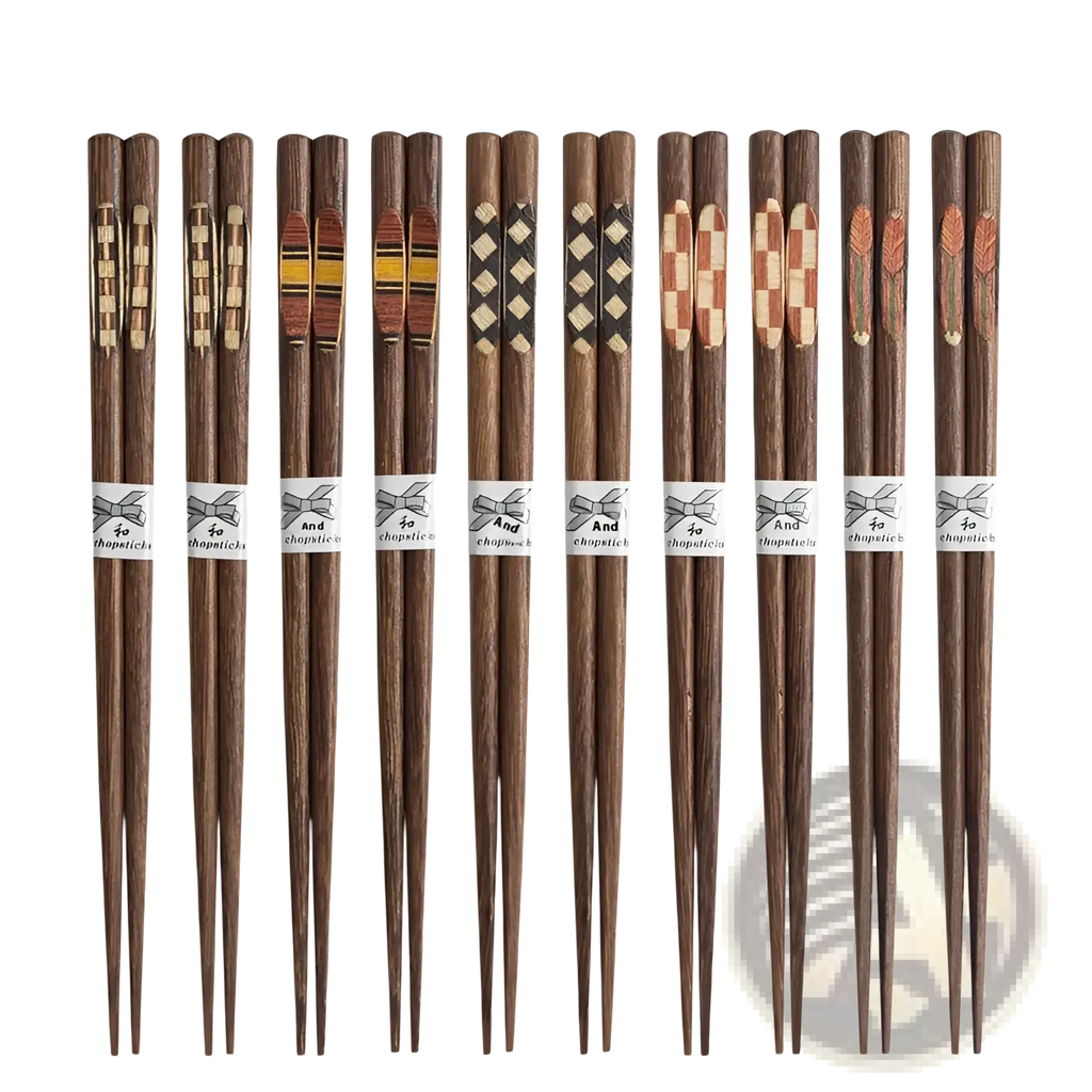 Set of ten pairs of dark brown wooden chopsticks with non slip tips and decorative inlays and white paper bands