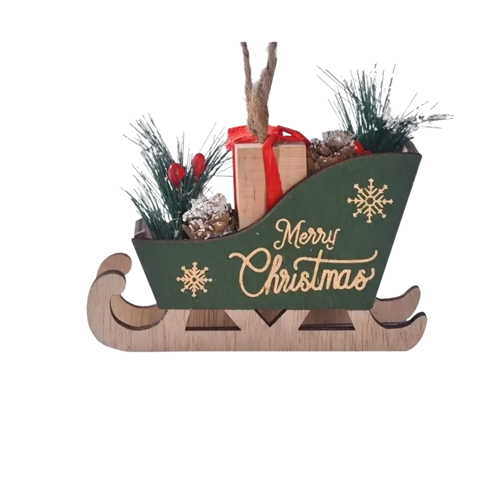 Green wooden christmas sleigh tree hanging ornament with gold merry christmas script, pinecones, and wrapped gift inside