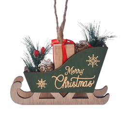 Green wooden christmas sleigh tree hanging ornament with gold merry christmas script filled with pine branches and berries