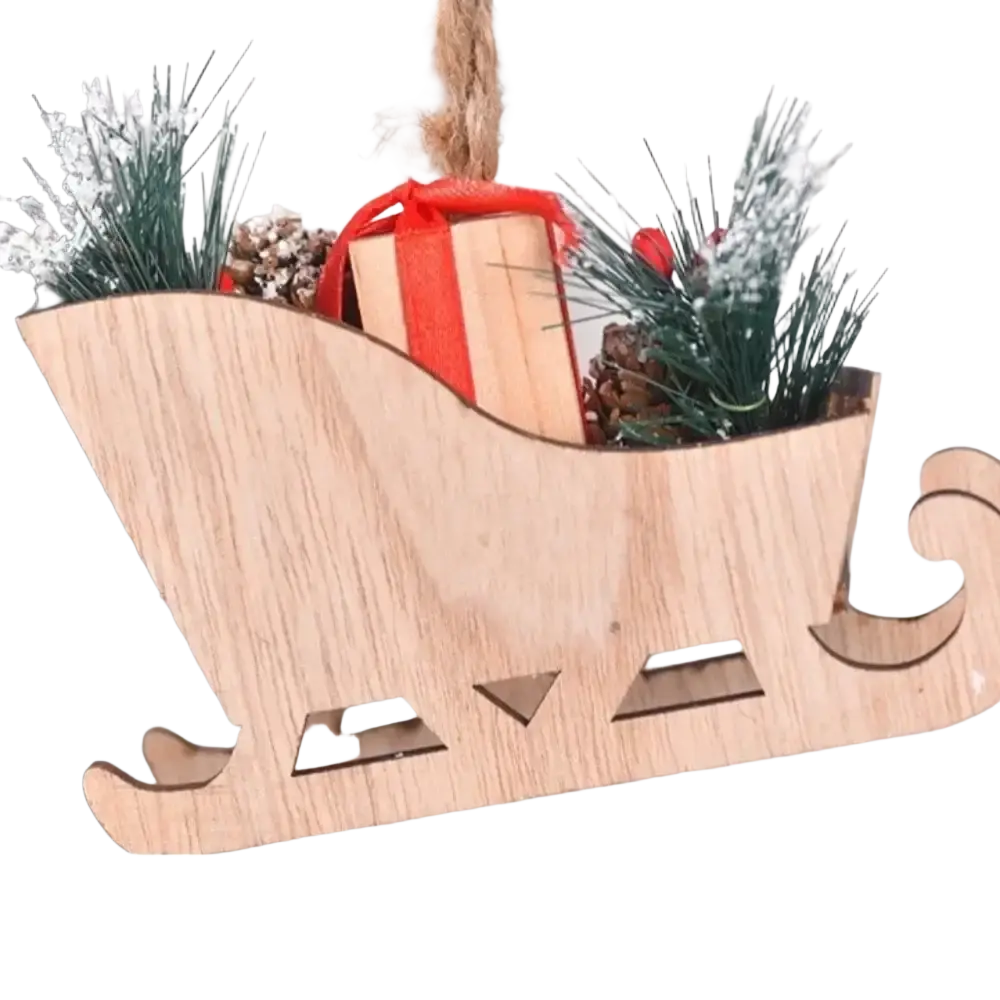Light-colored wooden christmas tree sleigh ornament with red ribbon gift and faux greenery for tree hanging