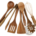 Set of seven warm brown wooden cooking utensils with natural grain including spoons spatulas whisk and pasta server