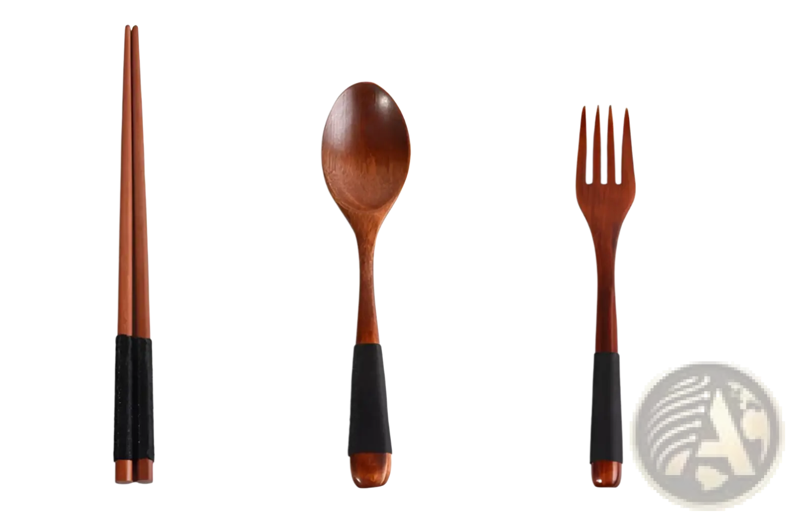 Set of four wooden reusable travel utensils with black rubberized grips in a wooden cutlery set