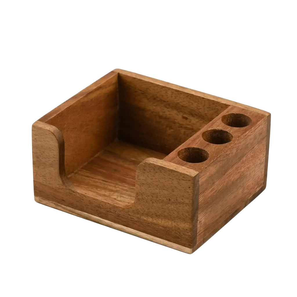 A warm-toned wooden desk organizer with three circular slots and a recessed area for holding pens and small items