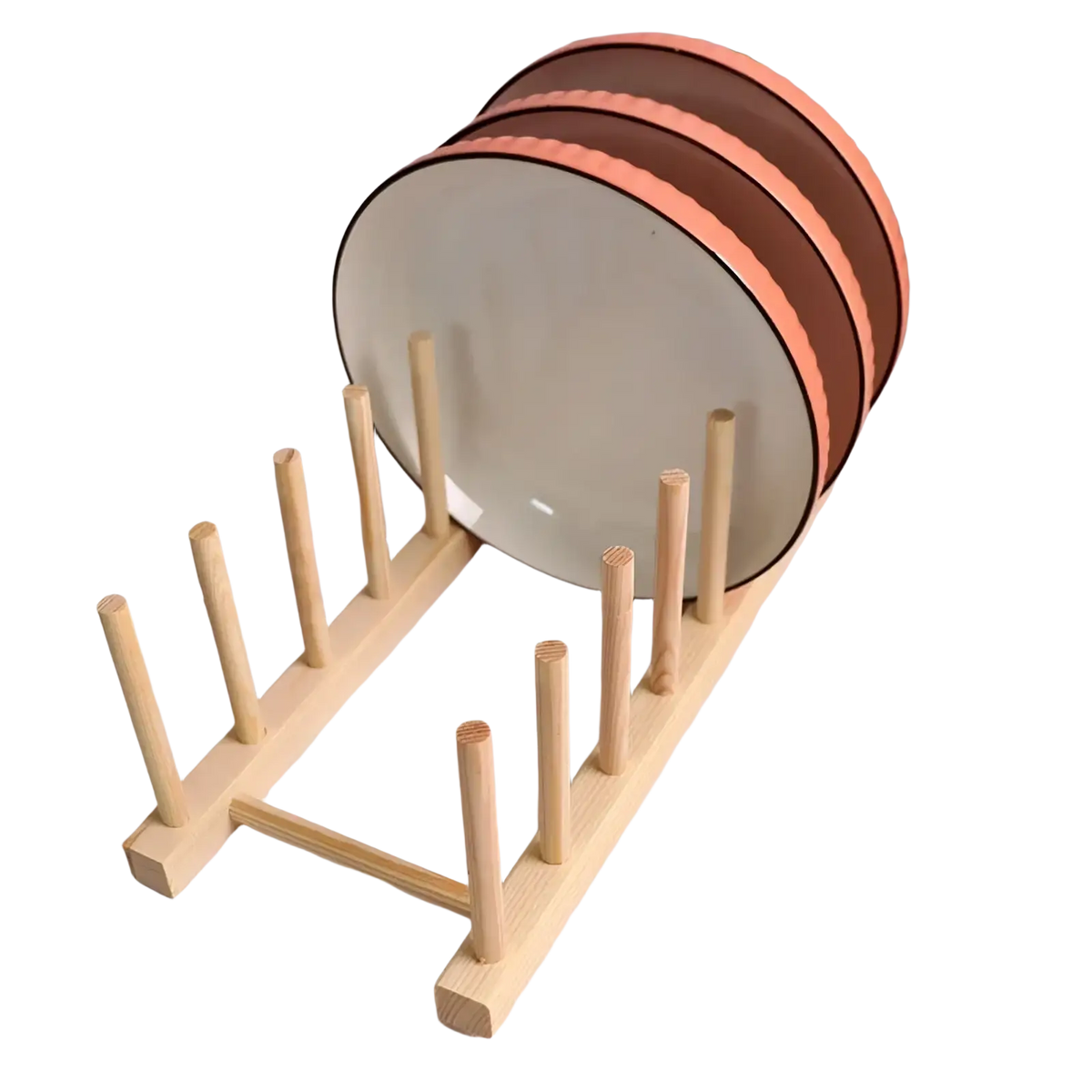 Light-colored wooden dish drying rack with vertical slots holding stacked ceramic plates with brown and peach stripes
