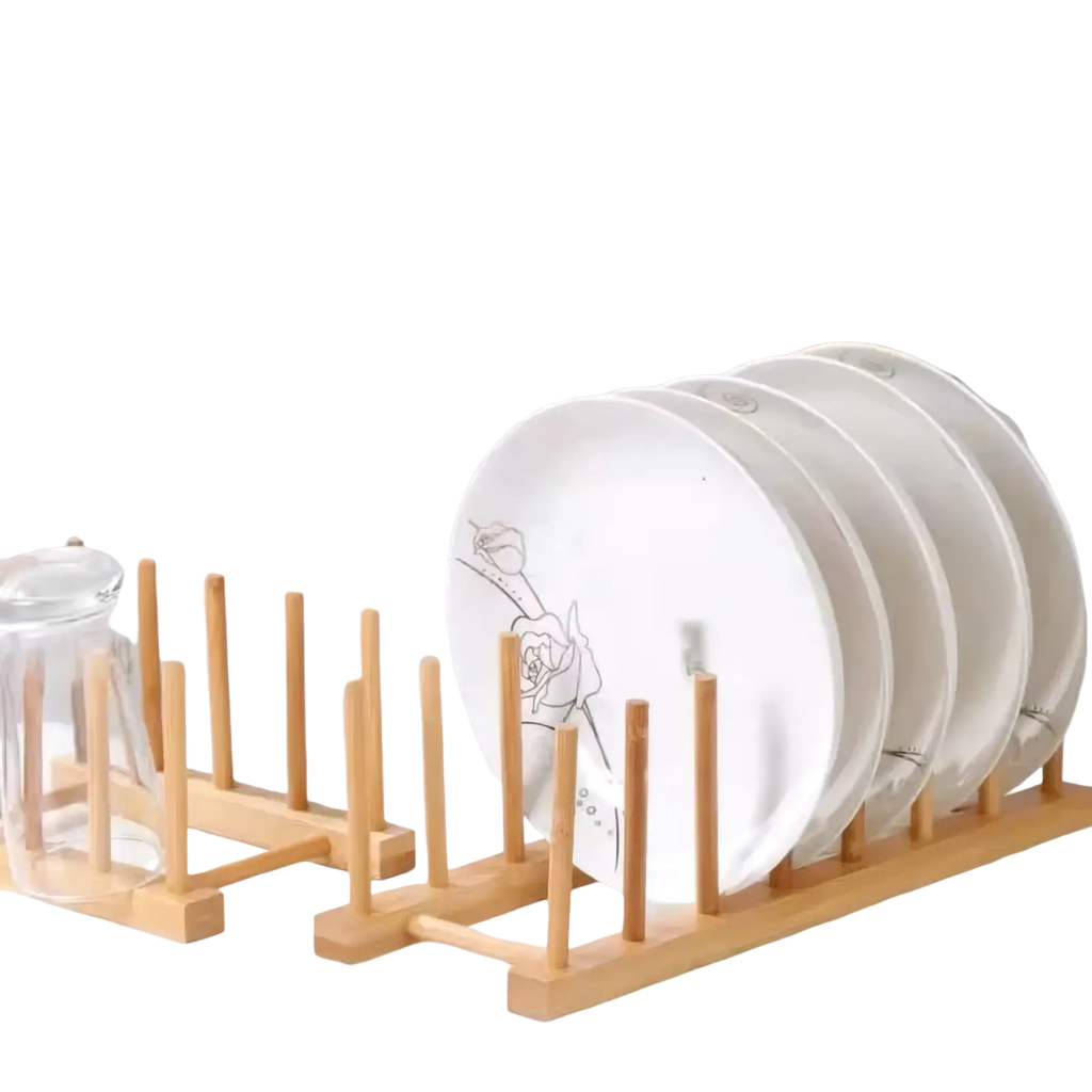 Wooden dish drying rack in light wood bamboo holding white plates with delicate black floral designs
