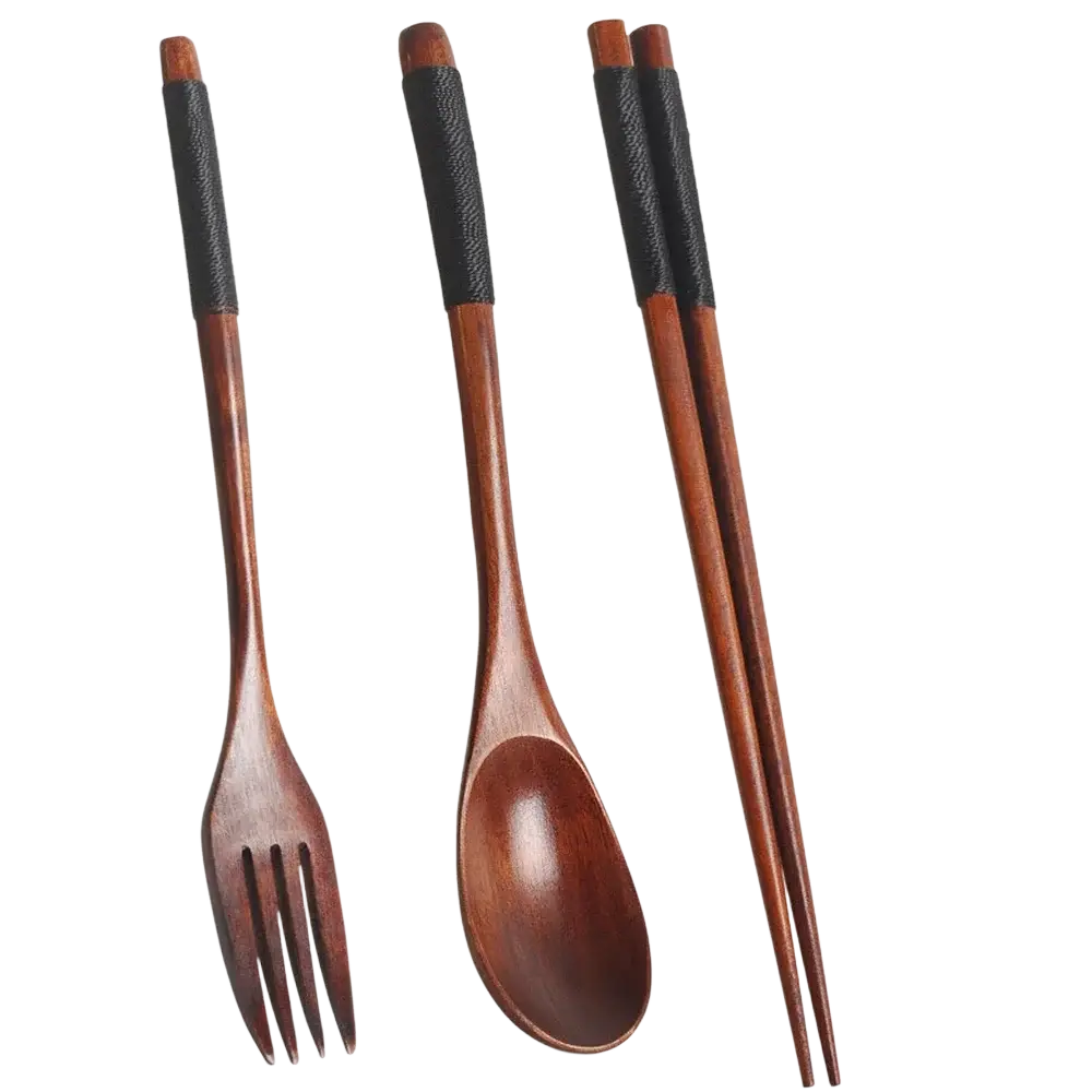 Set of three wooden eating utensils with black textured grip handles from a portable eco-friendly cutlery set