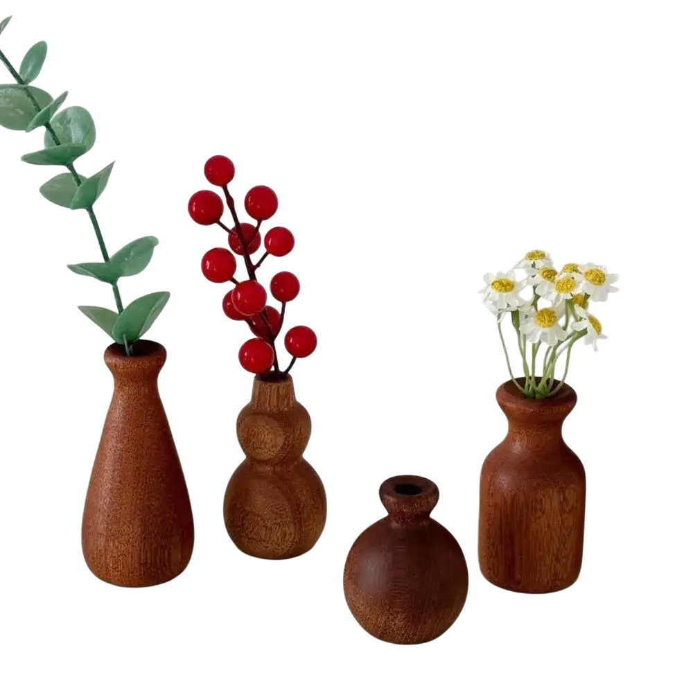 Set of four rustic wooden flower vases in warm brown tones with unique shapes and natural wood grain textures