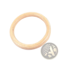 Light-colored wooden gymnastics ring with smooth natural finish and visible wood grain for strength training