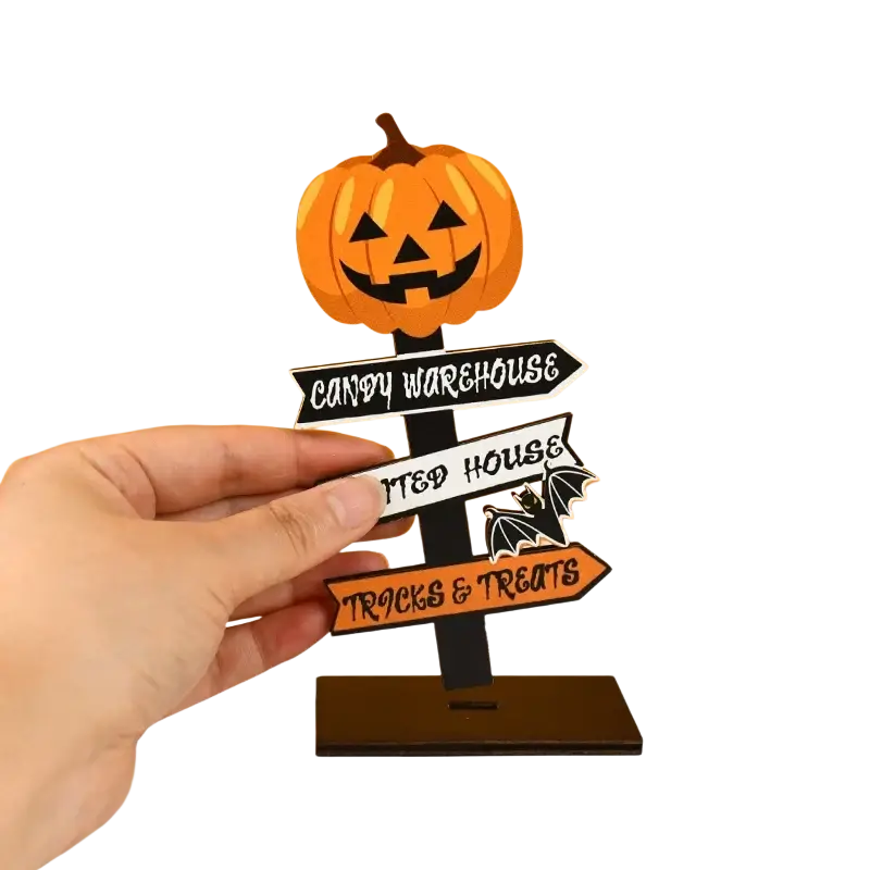 Wooden halloween directional sign desktop decoration with orange jack-o-lantern and black and orange candy warehouse and trick or treat house signs