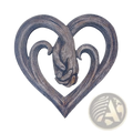 Rustic wooden heart wall decor featuring a carved hand holding another hand in its center sculpture