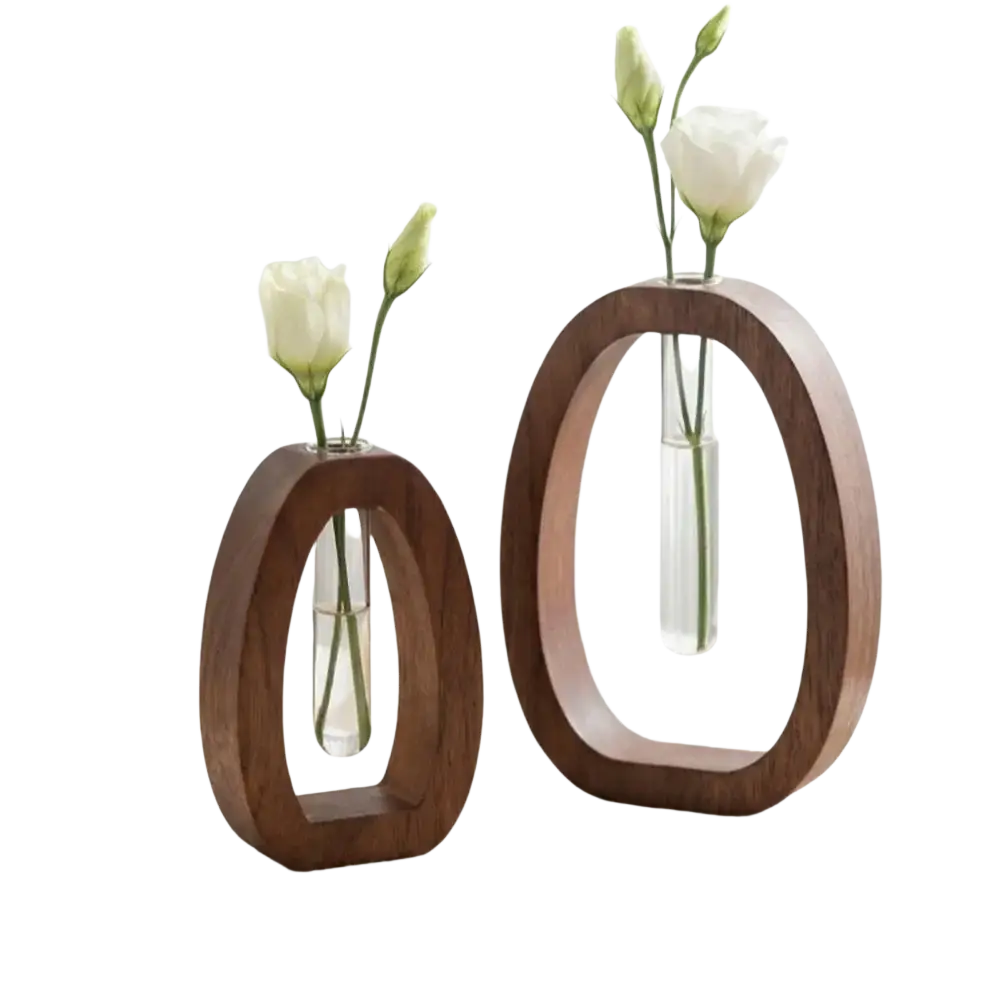 Two minimalist wooden oval vases with clear glass tubes holding white flowers wooden hydroponic desktop planters