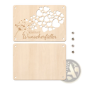 Light-colored wooden money gift card plaque with laser-engraved dandelion heart design and german text kleiner wunscherfüller