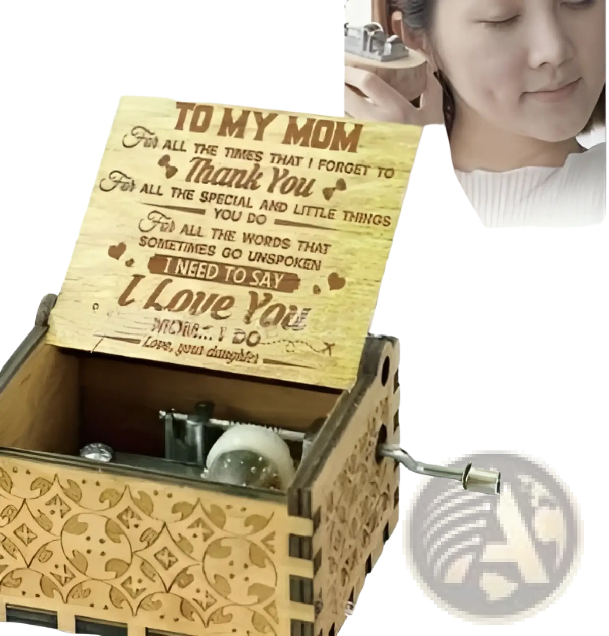 A light brown wooden music box with hand crank, intricate laser-engraved patterns, and a personalized lid message