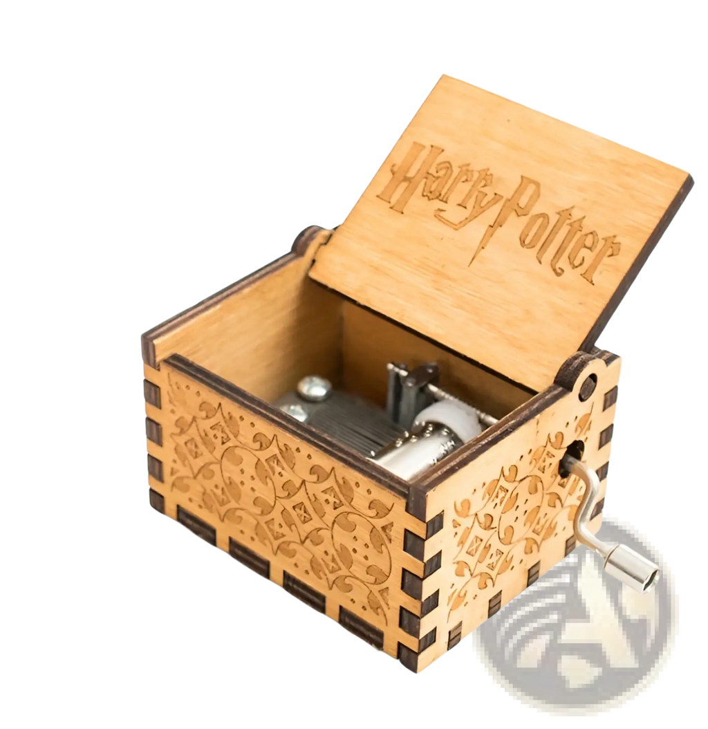 Wooden music box with hand crank carved with harry potter themes made of light wood with intricate engravings
