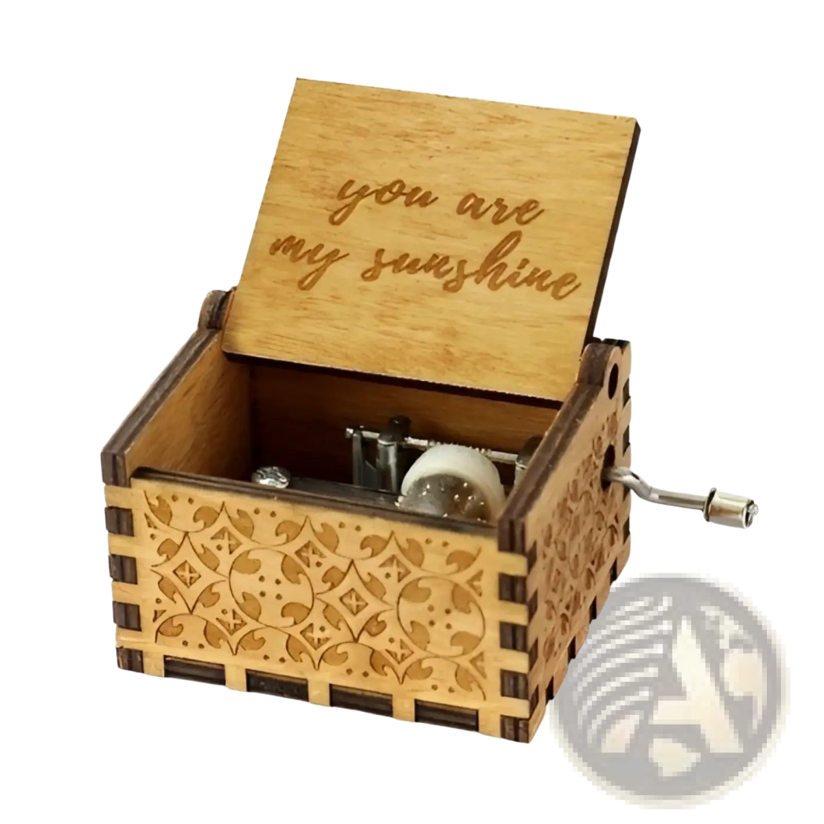 A light brown wooden music box with hand crank carved geometric patterns and a lid engraved with you are my sunshine