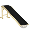 Black fabric-covered wooden pet ramp with light wood frame and non-slip carpet platform for bed access shown from back side