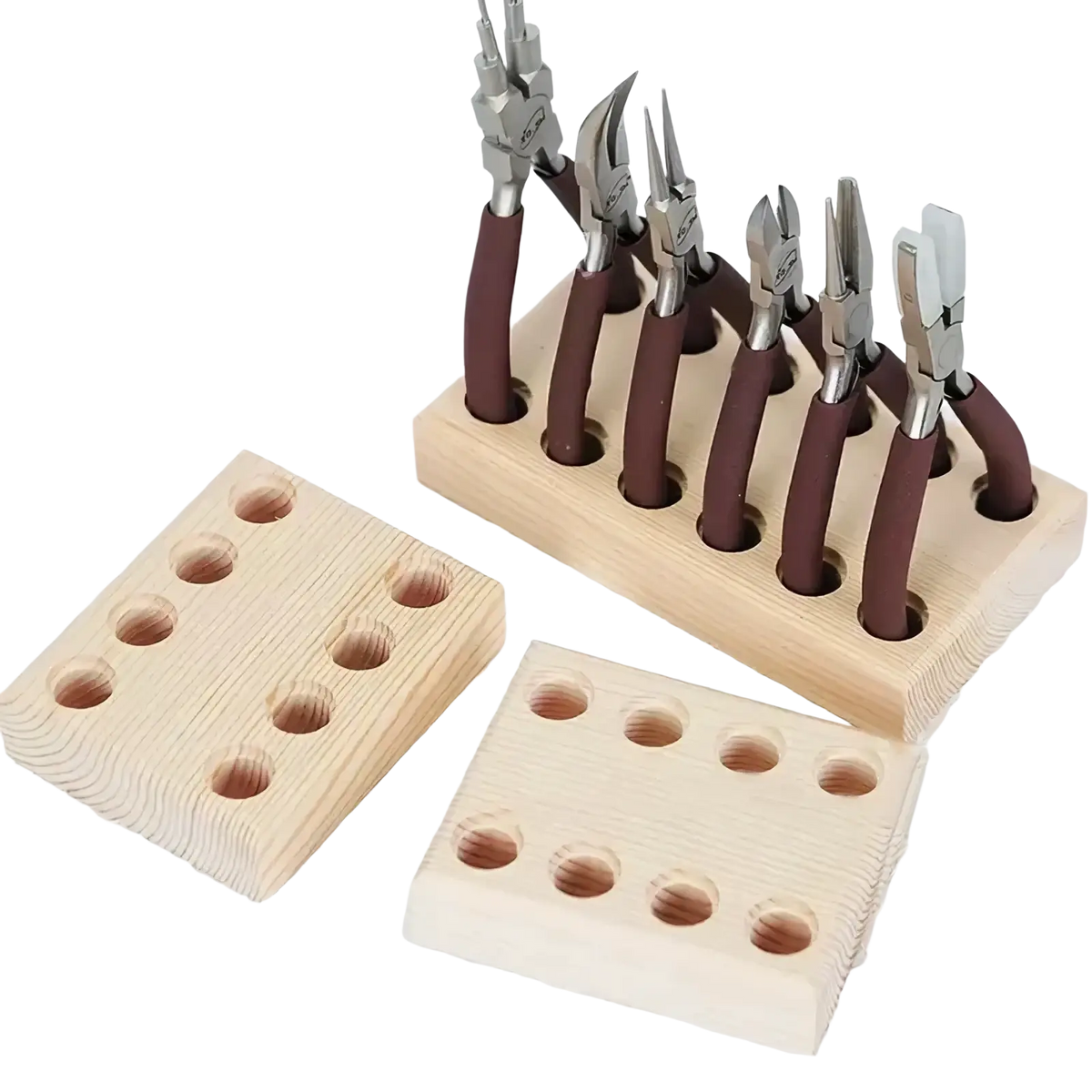 Set of six jeweler’s pliers with brown rubberized handles and silver metal heads neatly arranged in wooden pegboard holder