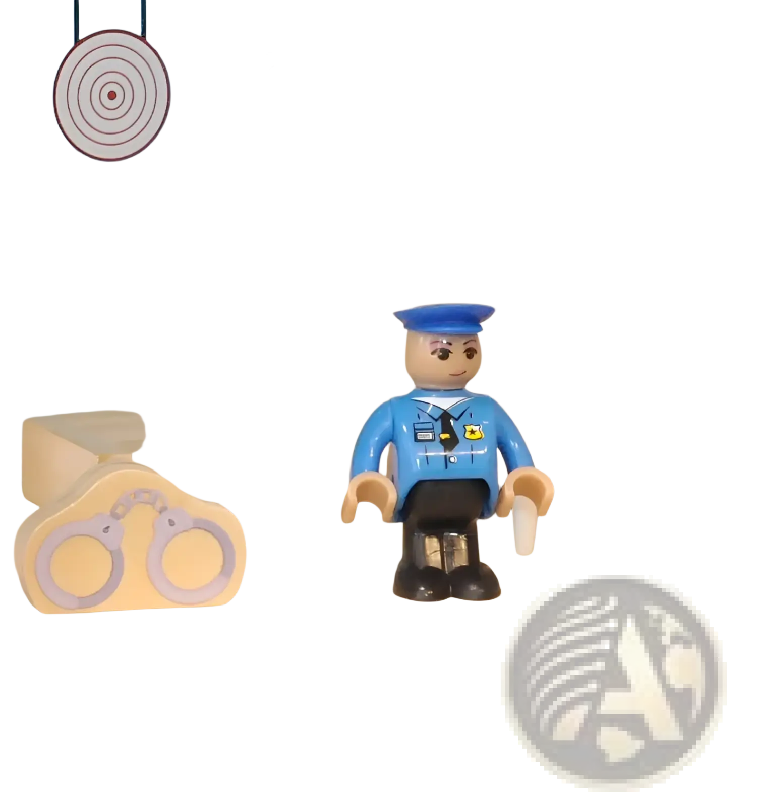 Blue wooden police officer toy figure with black boots and badge from wooden police and fire station playset for kids