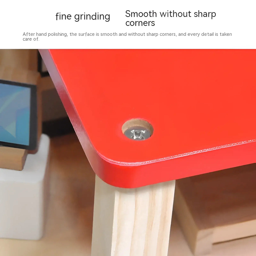 Red wooden table with smooth rounded edges and visible screw hole from wooden police and fire station playset for kids