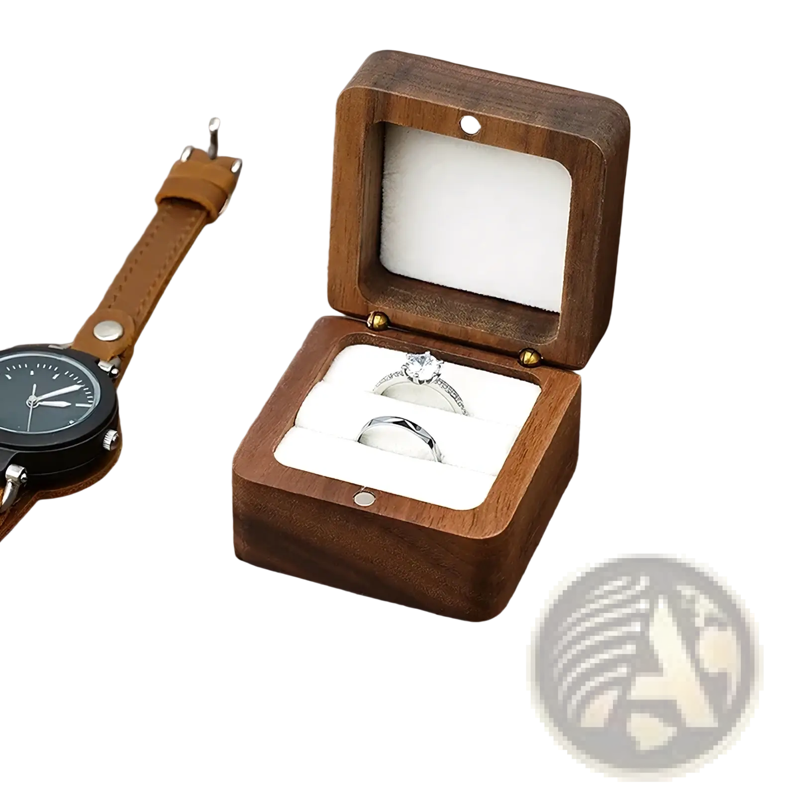 A dark brown wooden ring box with hinged lid white velvet interior displaying two rings for proposal engagement use