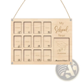 Light-colored wooden school year photo frame with engraved grade slots and a graduation design for display