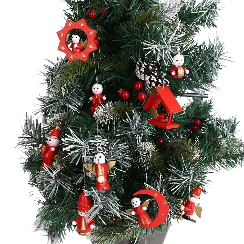 Red wooden small christmas ornaments with painted figures and star designs in a boxed holiday decor set