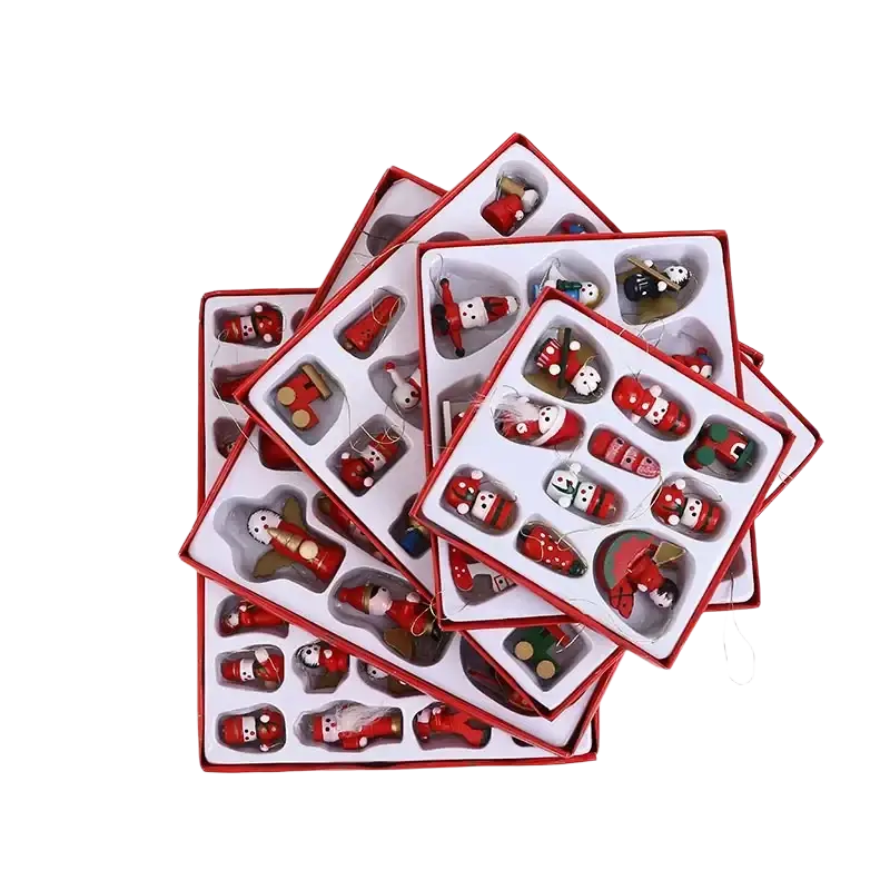 Wooden small red and white christmas ornament figures in a gift box for holiday decor