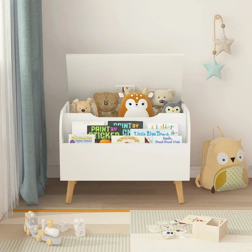 White wooden toy box and bookshelf bench with safety hinge holding stuffed animals and children’s books