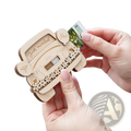 A light wood-carved wooden wedding car money holder with just married and mr text for wedding gifts