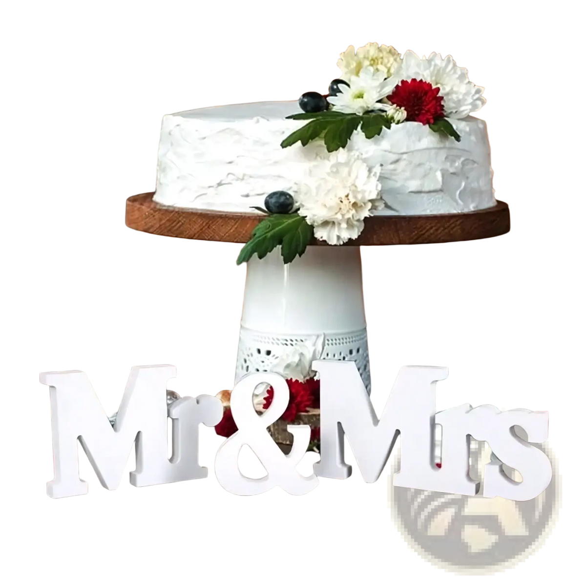 A white frosted cake with textured icing and red and white flowers next to a wooden wedding table sign mr and mrs decor