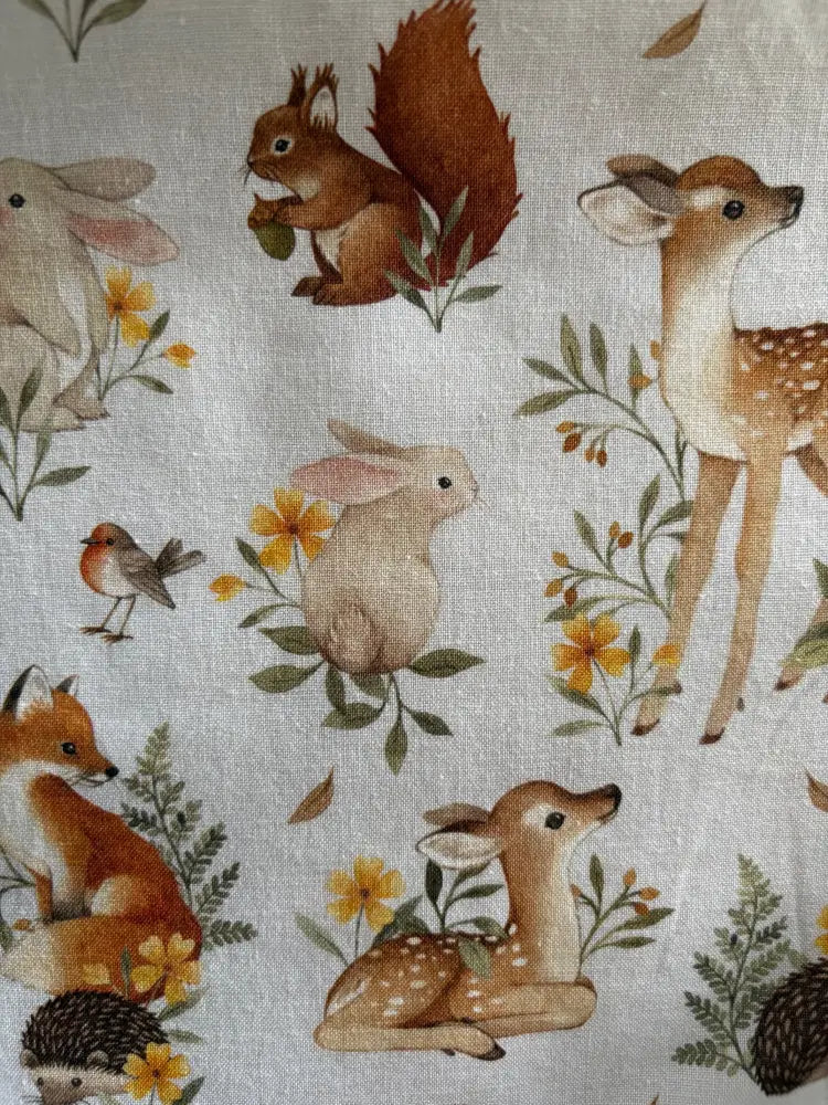Woodland animals greta cotton wrap dress with pockets in soft light gray featuring brown squirrels deer rabbits foxes and birds print