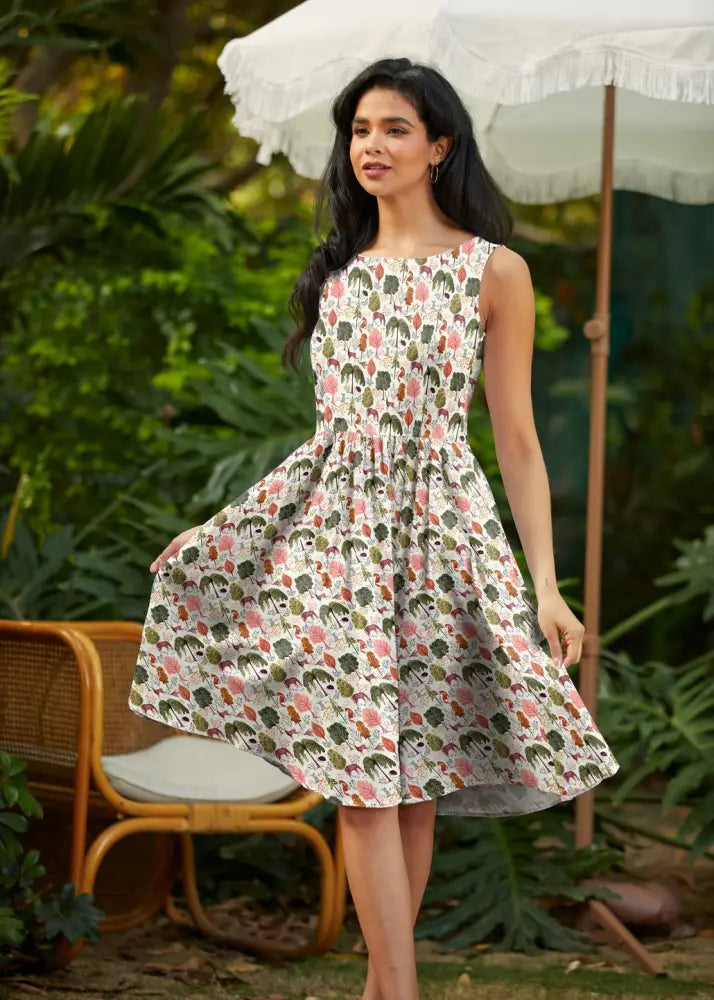 Sleeveless woodland vintage cream cotton a-line dress with pockets featuring stylized skull and foliage print