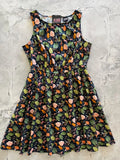 Sleeveless dark navy cotton dress with green and orange leaf pattern 1950s vintage style with pockets