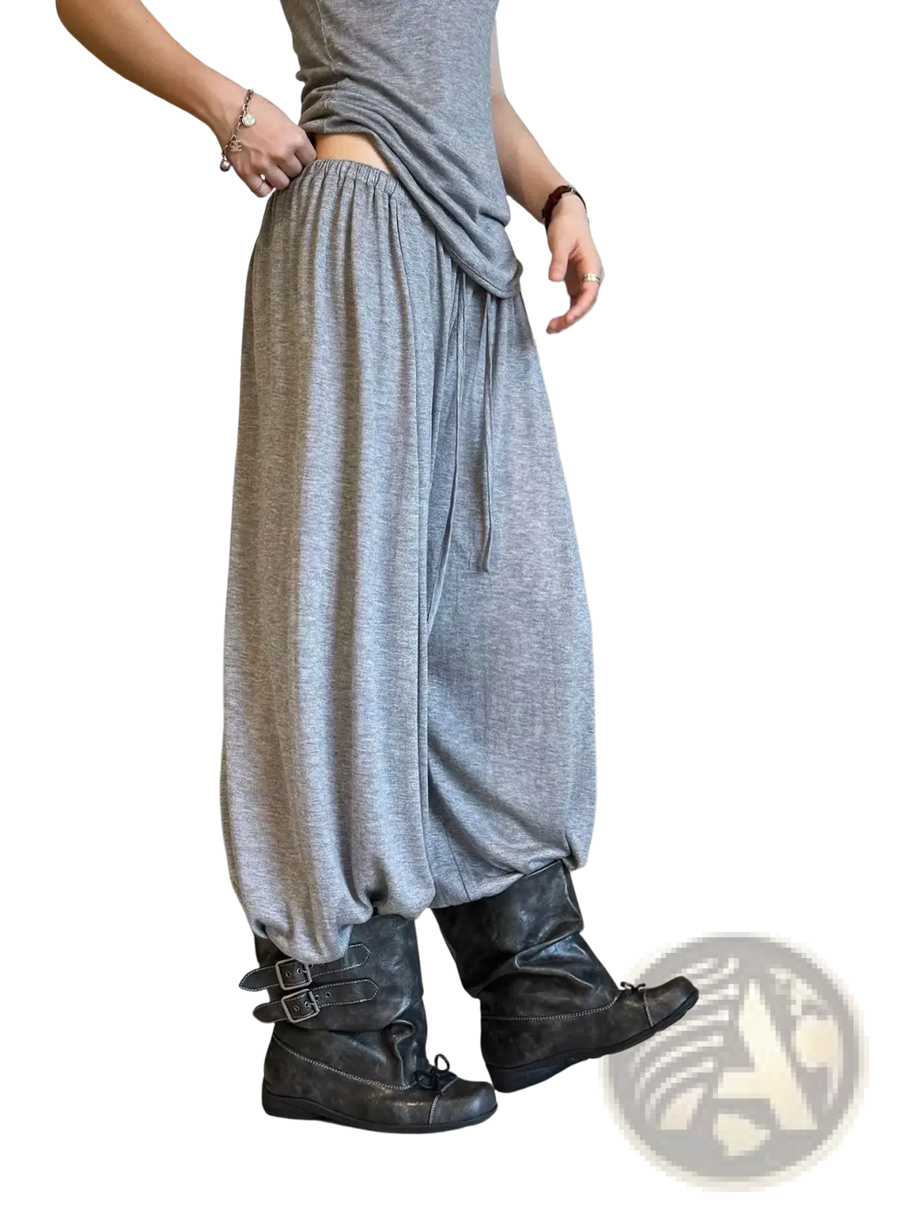 Gray wool blend wide leg pants with loose fit drawstring waist and elastic cuffs shown from the front side