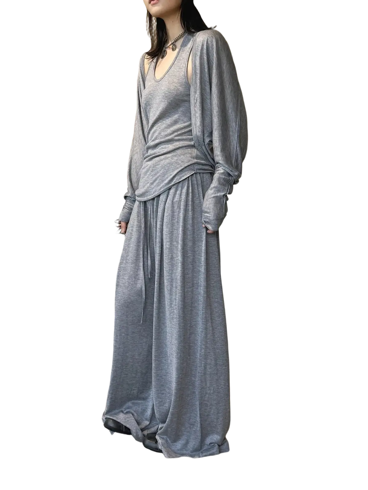 Gray knit wool blend two-piece set with long sleeves and flowing skirt featuring wide leg pants design