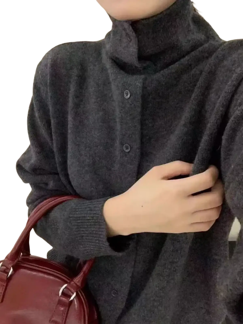 Dark gray wool button turtleneck sweater with soft knit texture and three matching buttons down the front
