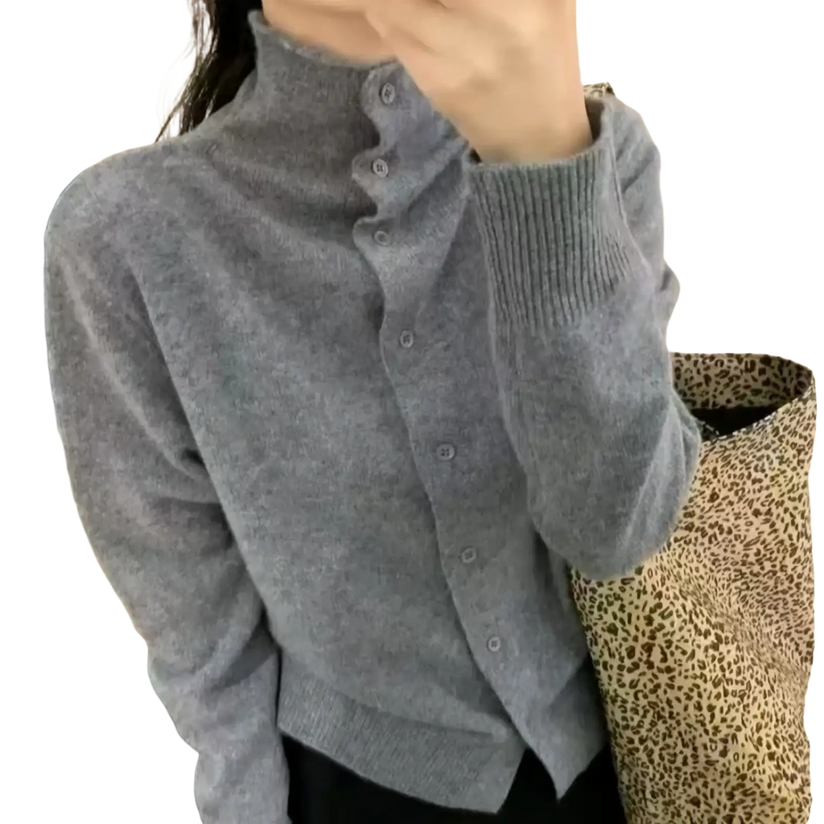 A soft heather gray wool button turtleneck sweater with a high collar and knitted button closure