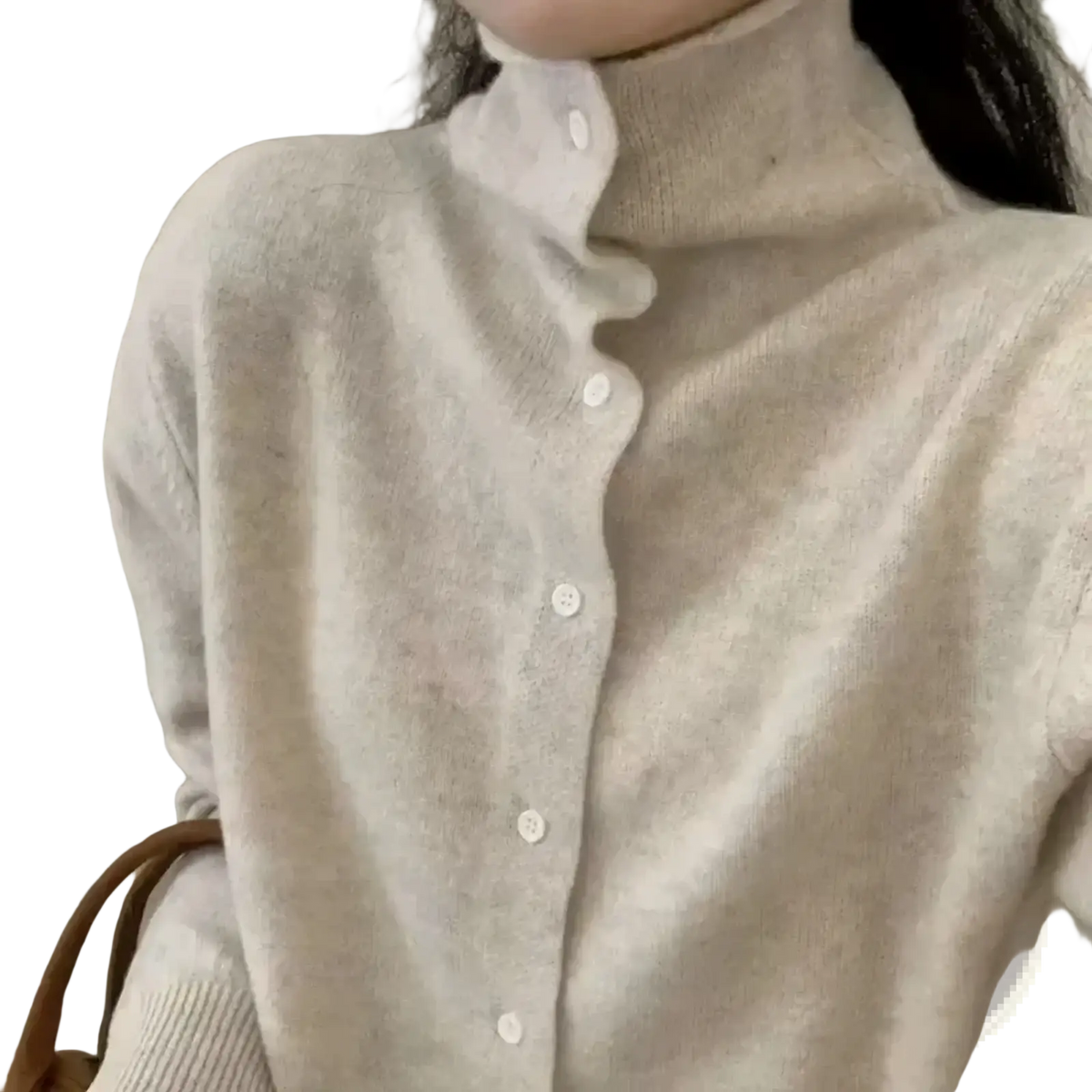 A soft off-white wool button turtleneck sweater with a subtle textured knit and matching buttons