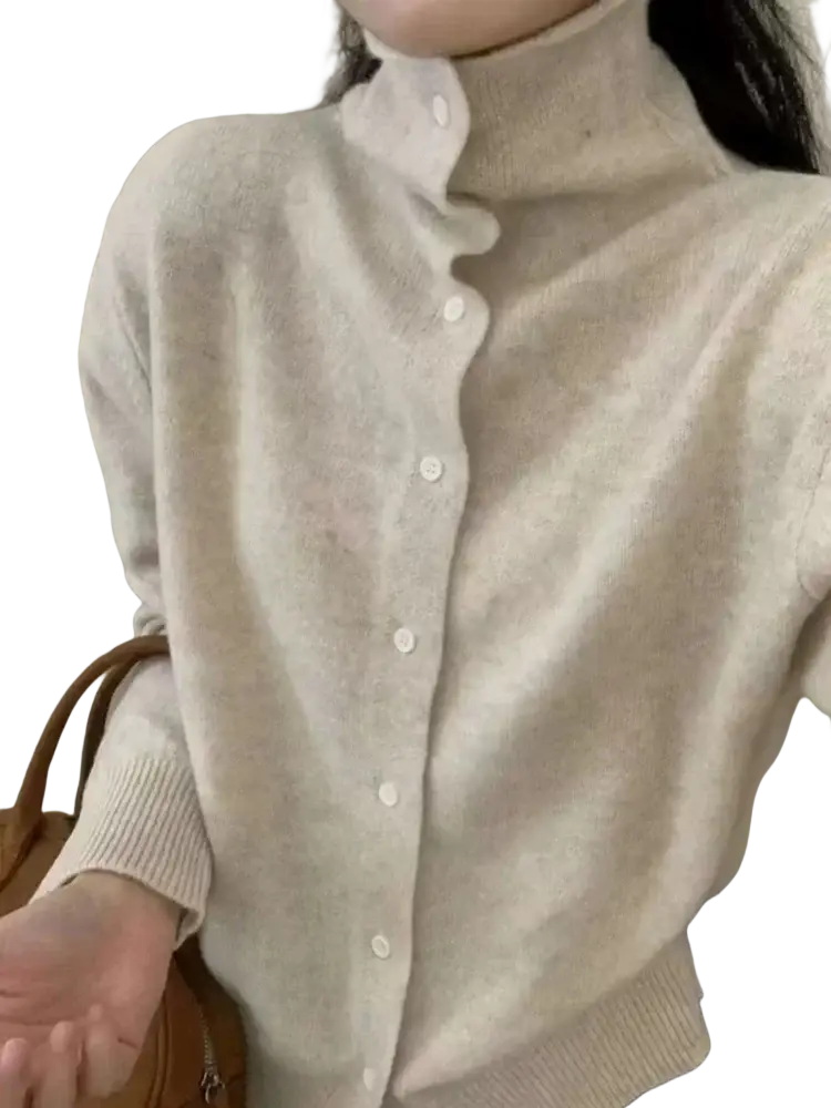 A soft off-white wool button turtleneck sweater with high collar and button closure knit cardigan