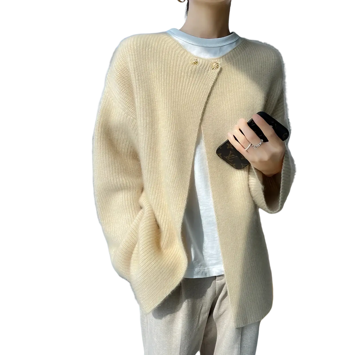 Cream-colored wool cardigan women winter sweater with soft knit ribbed texture and delicate gold-tone buttons