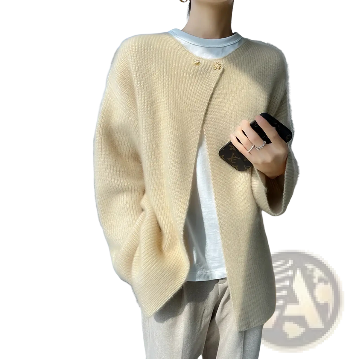 Cream-colored wool cardigan women winter sweater with soft knit ribbed texture and delicate gold-tone buttons
