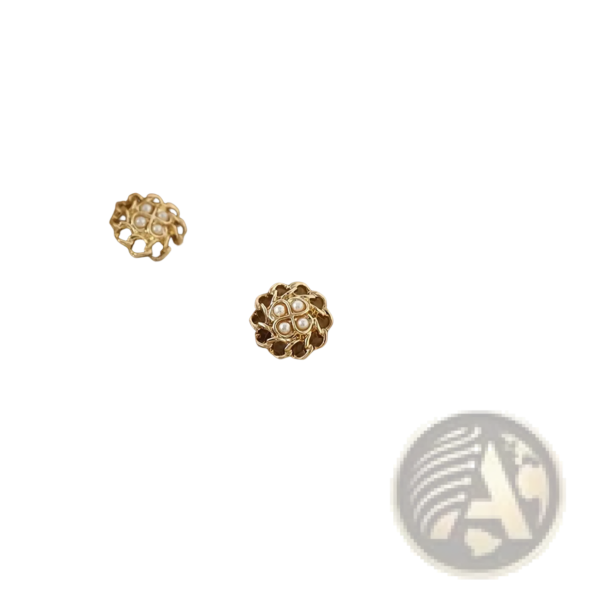 Gold-toned floral button with pearl accents on beige ribbed knit wool cardigan for women winter sweater