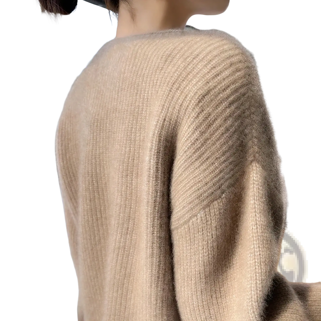 A soft beige ribbed wool cardigan for women with a cozy fuzzy texture ideal for winter wear