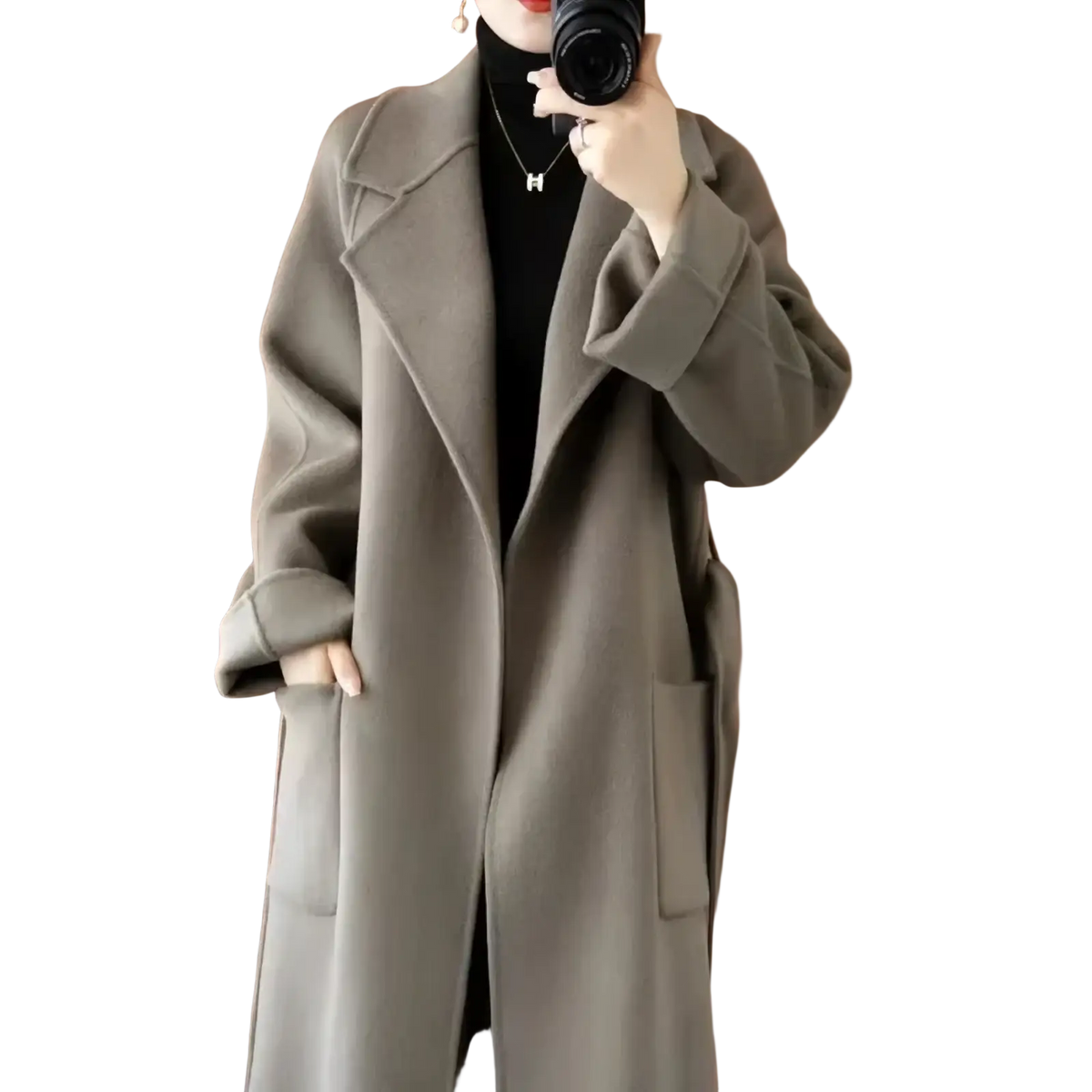 A sleek olive green wool cashmere belted long overcoat with a classic double breasted design and large patch pockets