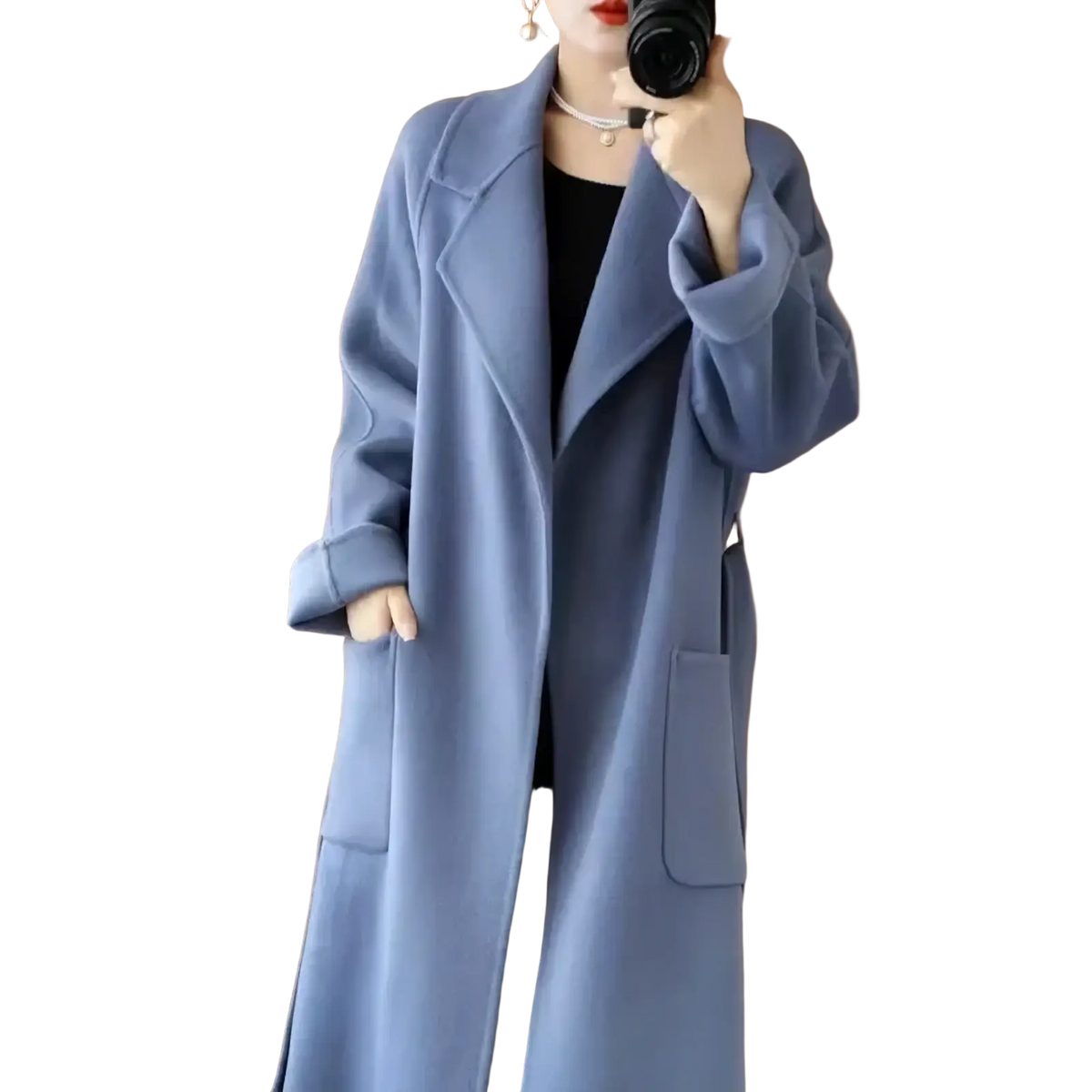 A soft light blue wool cashmere belted long overcoat with a classic double-breasted design and large patch pockets