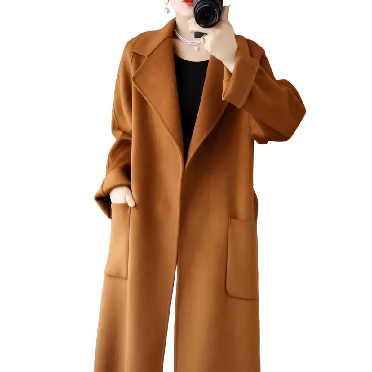 A warm camel-colored wool cashmere belted long overcoat with double-breasted design and large patch pockets