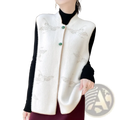 Cream-colored wool embroidered vest for women featuring delicate silver bird embroidery and jade green buttons